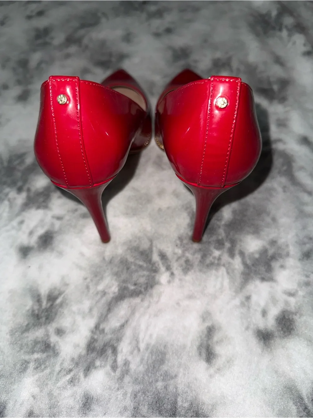 BCBGeneration Red Patent Pointed-Toe Stiletto Pumps with Gold Trim